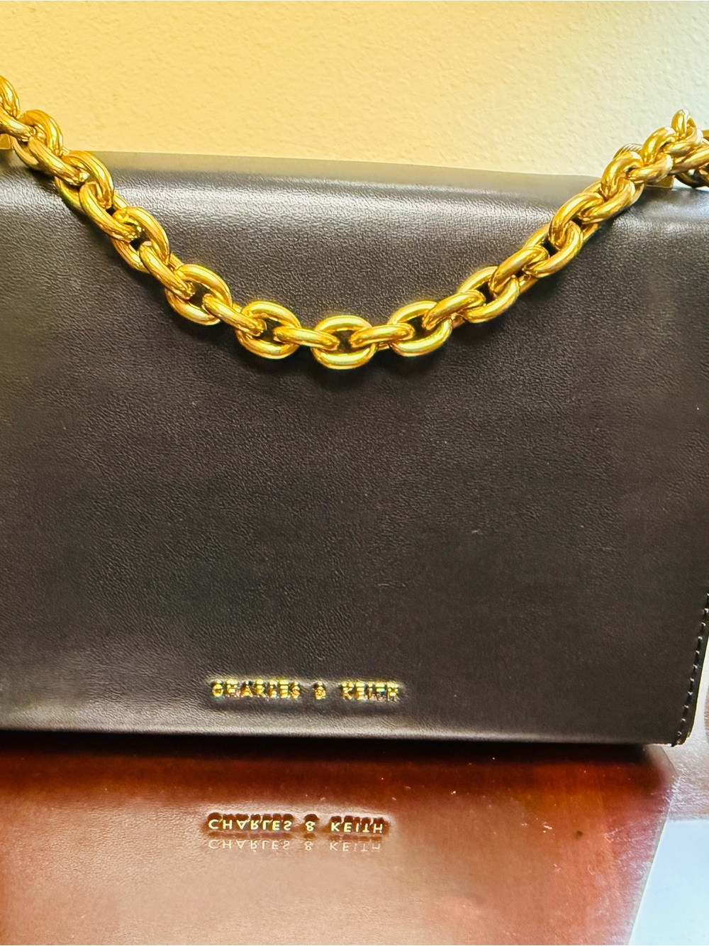Charles & Keith Black Leather Shoulder Bag with Gold Chain Strap